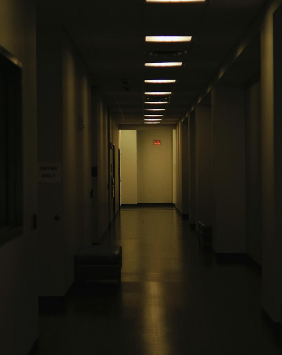 Dark internal corridor in a typical apartment building